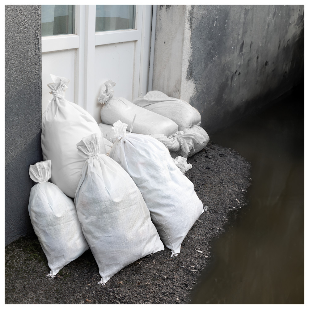 Sandsack als Hochwasserschutz für Betriebe